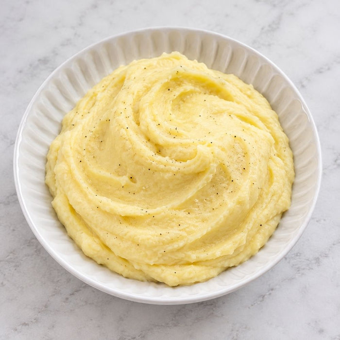 Cremet kartoffelmos af bagte kartofler