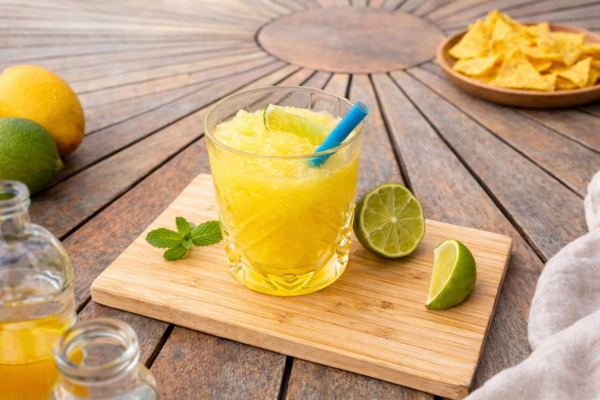 Gin Hass Slush Ice – frozen cocktail med mango og lime